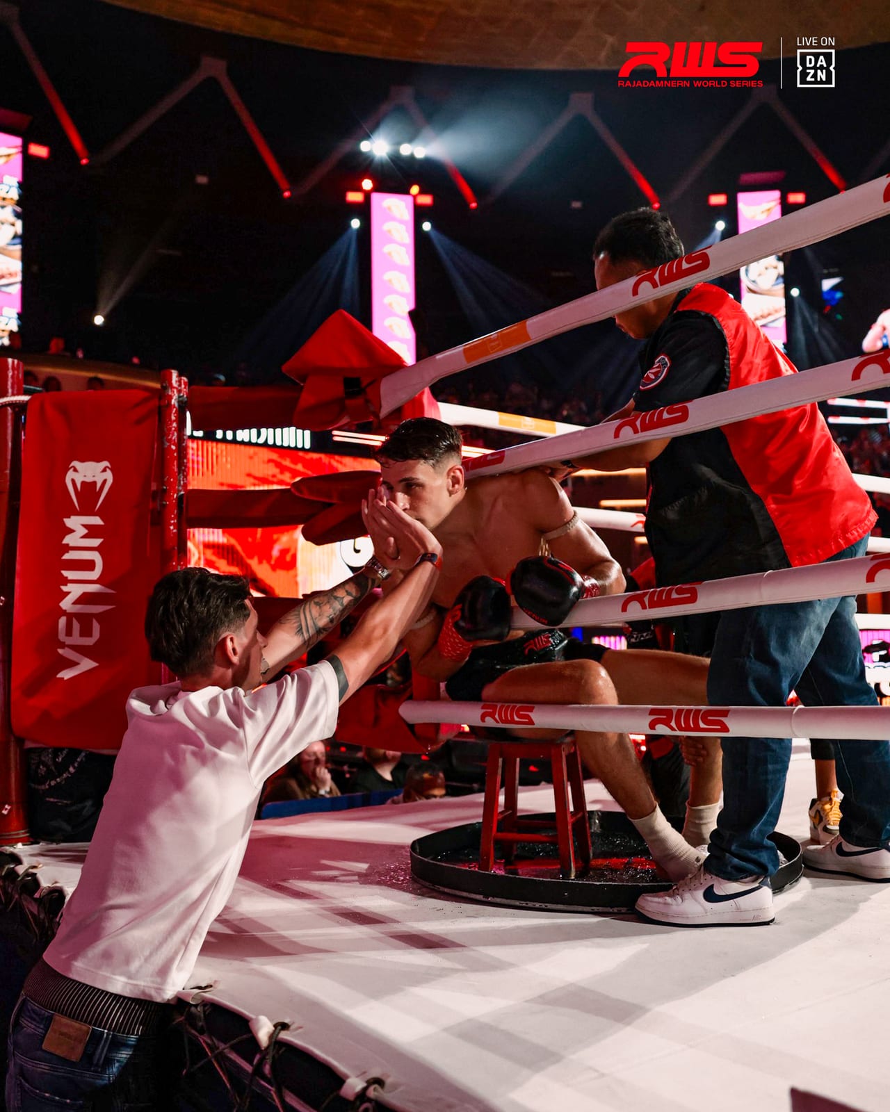 Louie Doherty receiving instructions in the corner between rounds