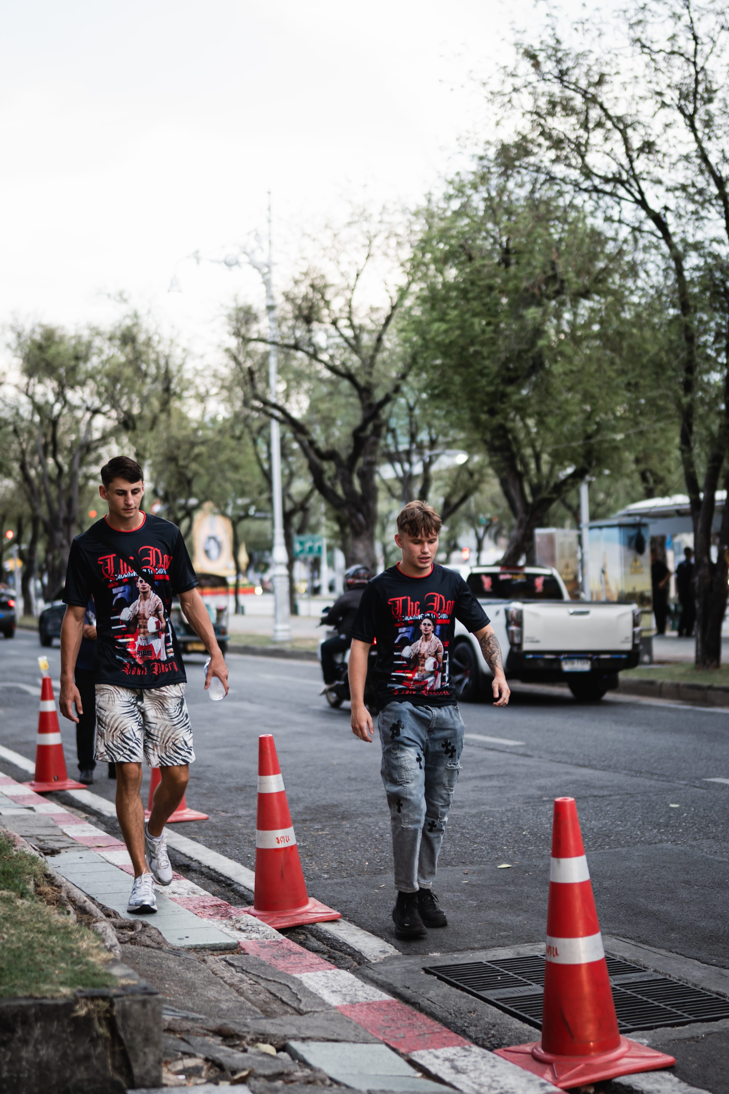 Louie Doherty walking a street in Thailand before weigh-ins